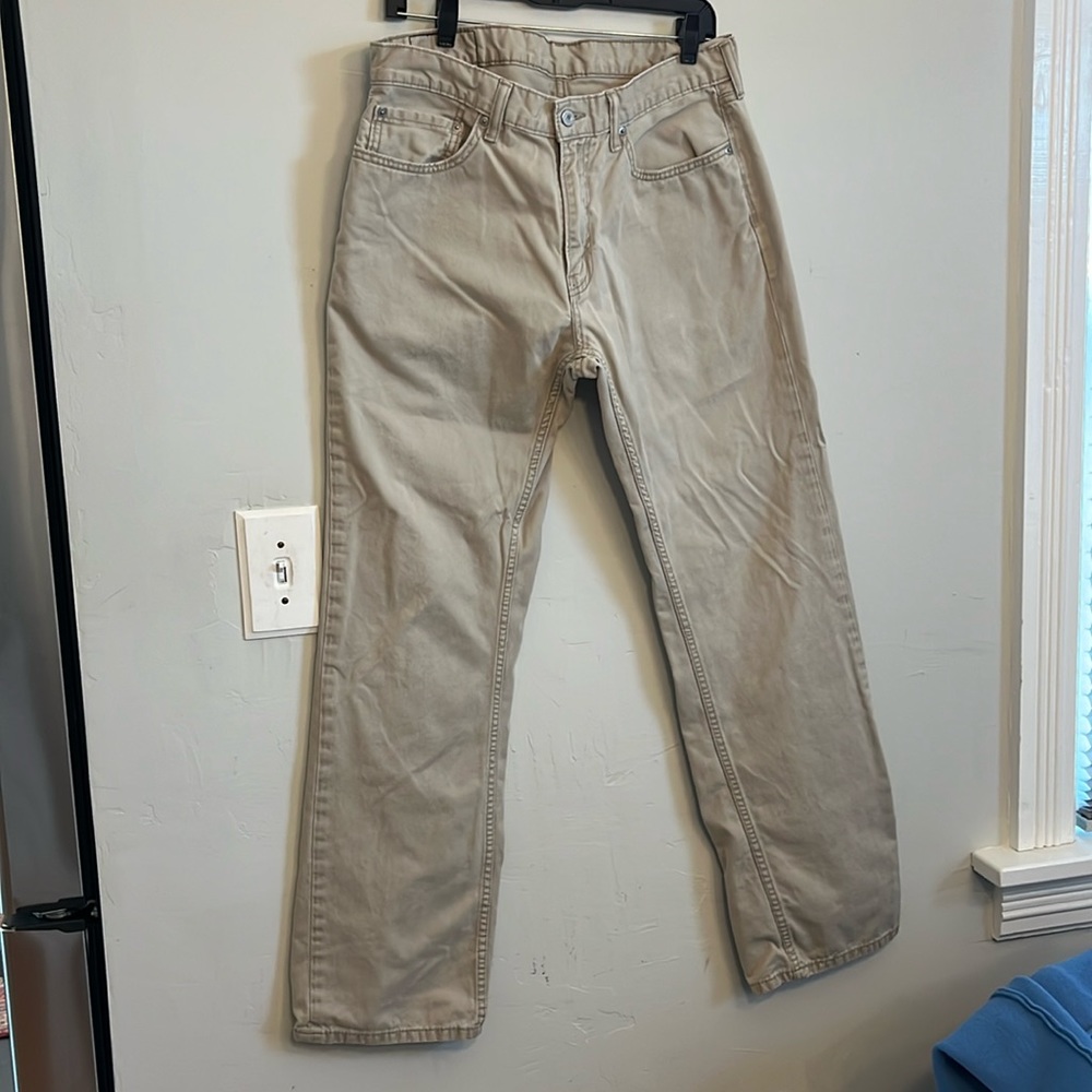 Levi’s 559 34 x 34 tan cotton jeans.